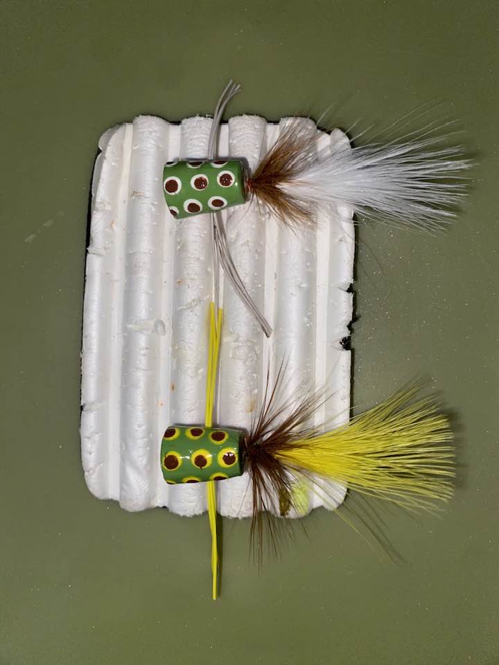 fish lure coming out of a bottle Sporting Wood Swimmer  Surfland Bait and Tackle Someone named TJ My second cast I caught a bass Cackalacky Booze Bait Fishing Lure