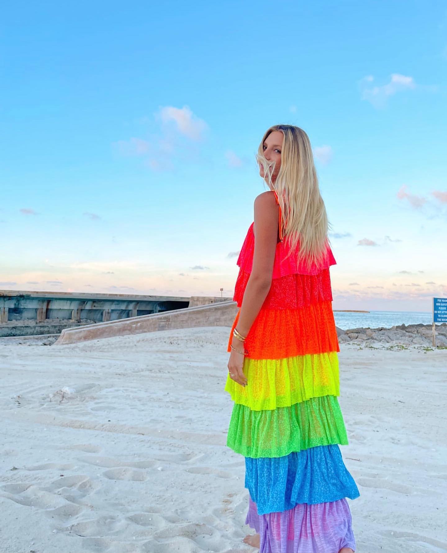 Beauty @carolenahuseby in the Rainbow Tiered Dress ✨🌈 #Pitusa