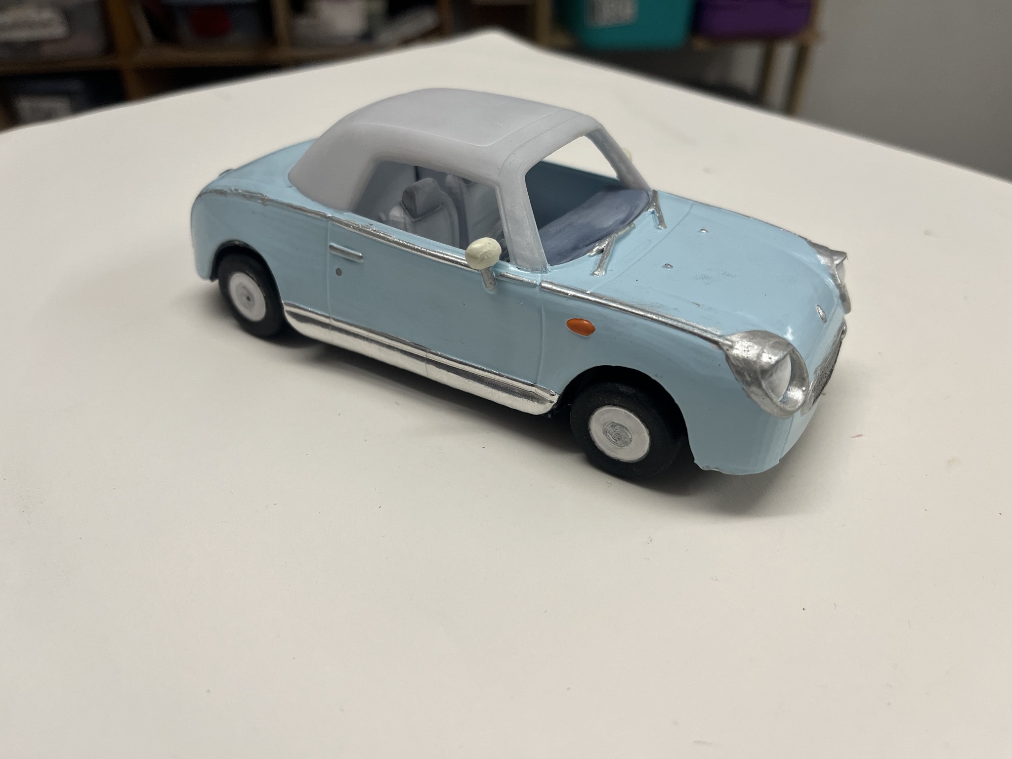 Nissan Figaro model kit in 1/24 and 1/18 scales