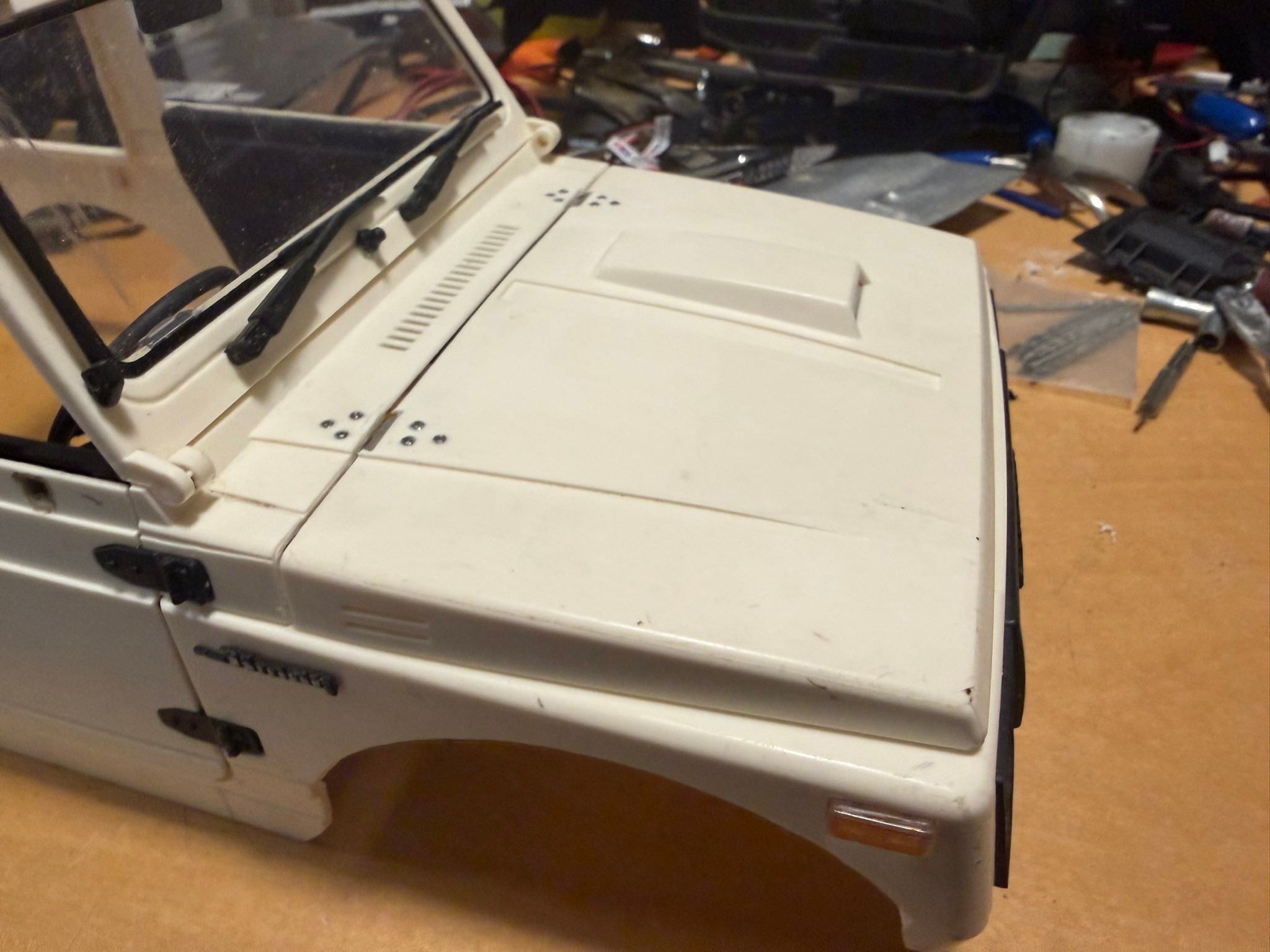 Custom WPL C74-1 car modifications with magnet hood latch