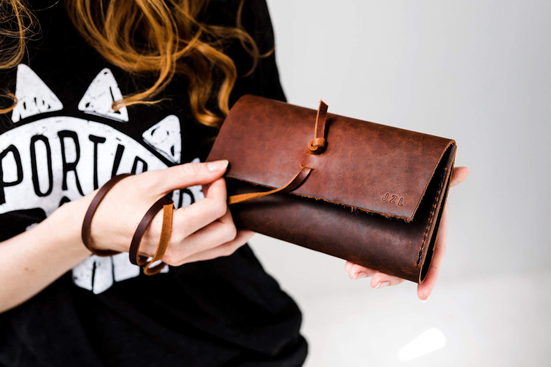 Our full-grain leather Wrap Wallet features a simple and timeless 