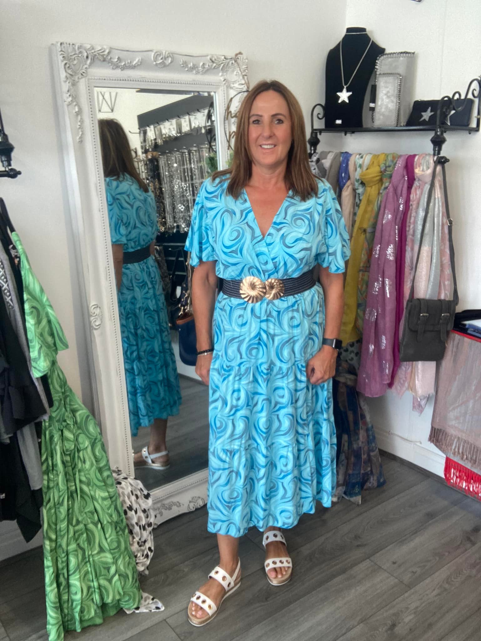 Very quality belted teal green skater dress. Uk size 12. Ksh 500. Model is 5'5