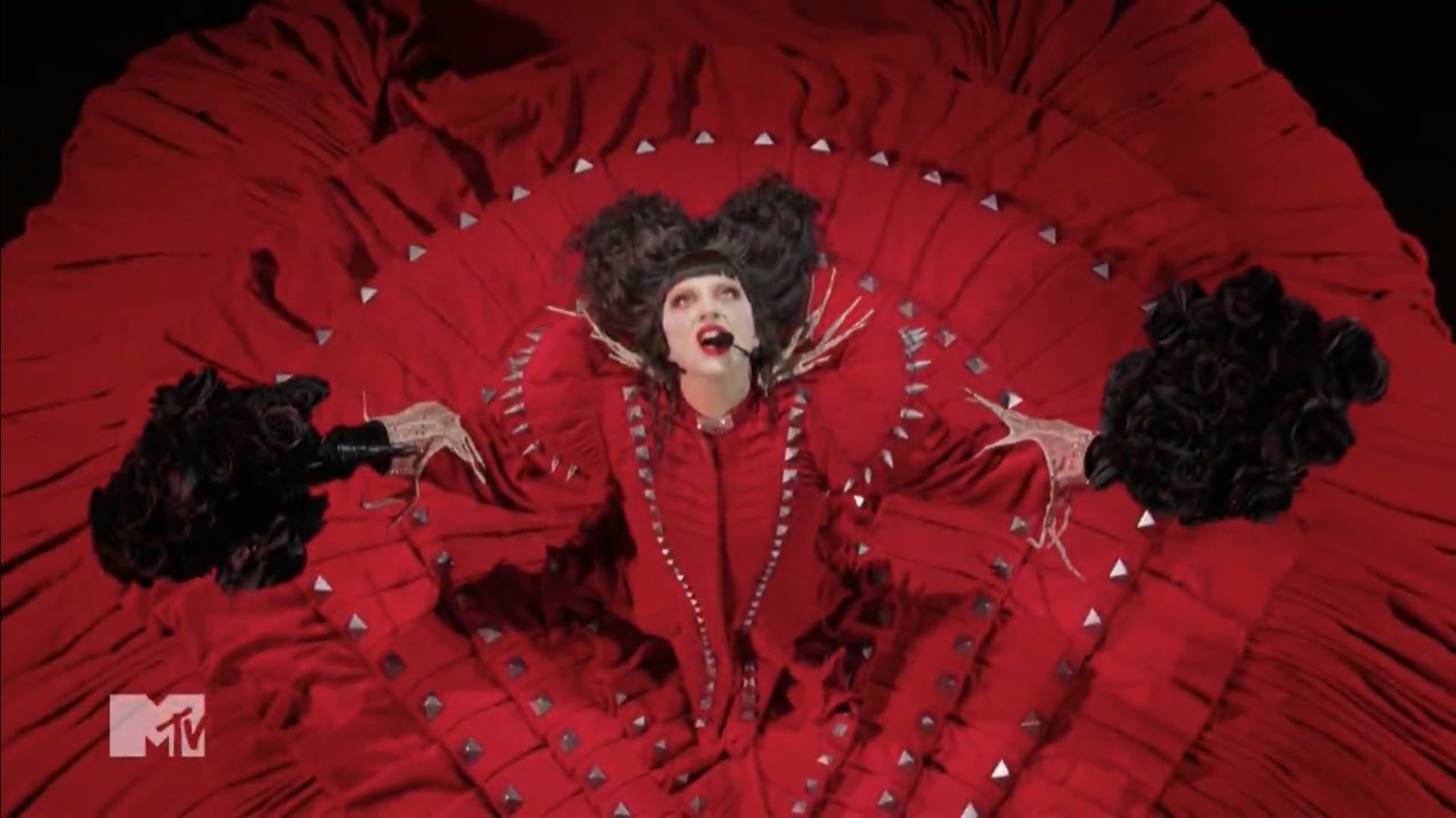 lady gaga red dress abracadabra 🎶 gets us ready for the mayhem of March Madness 🪄 sleeve_type:Convertible