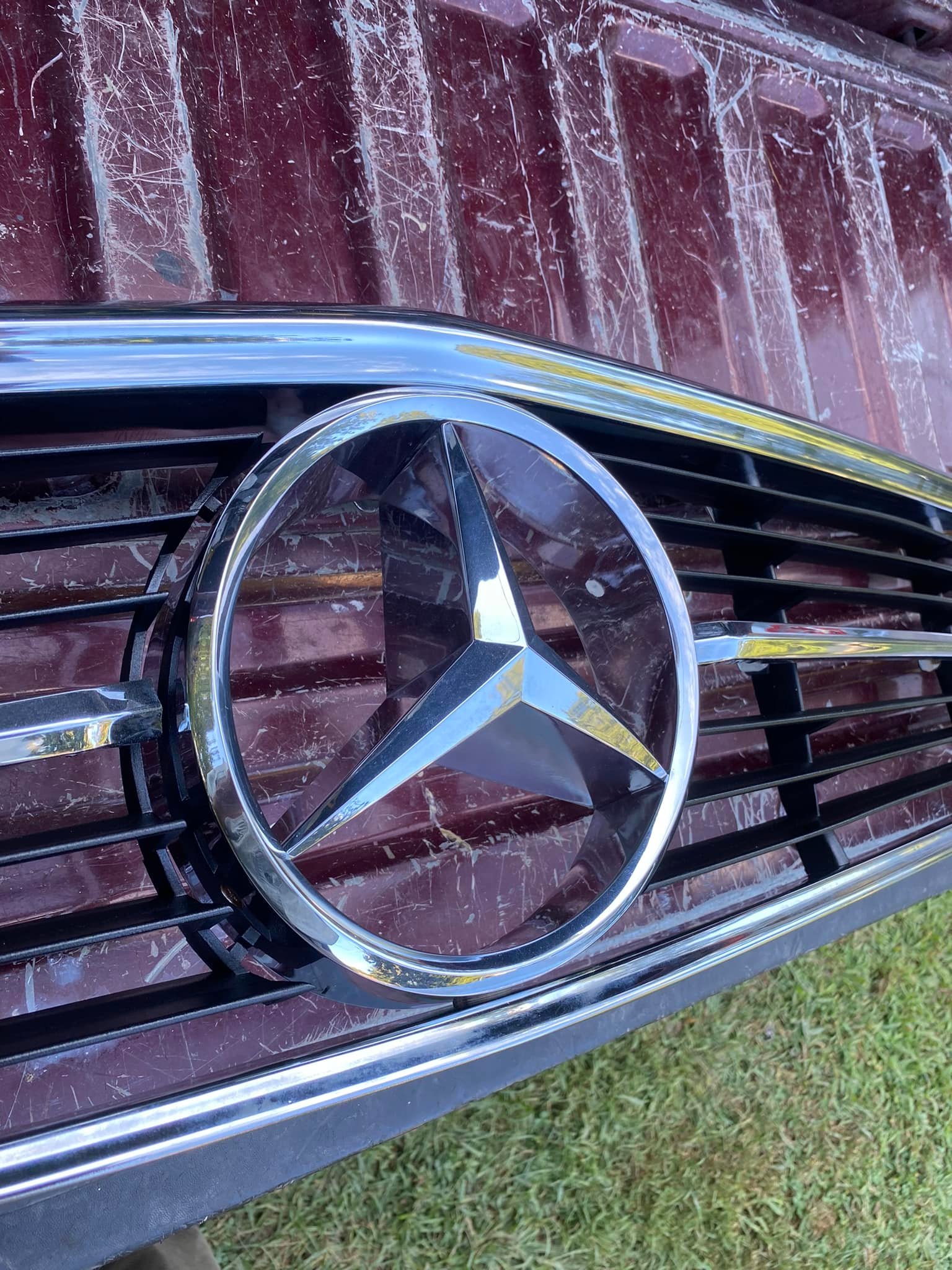 What is the story behind the chrome star on a Mercedes Benz 450SL 