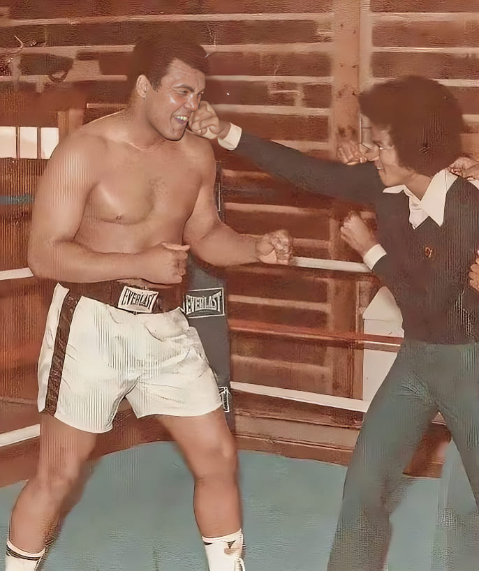 Muhammad Ali takes one on the nose from Michael Jackson at his