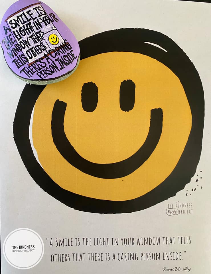 “A smile is the light in the... - The Kindness Rocks Project