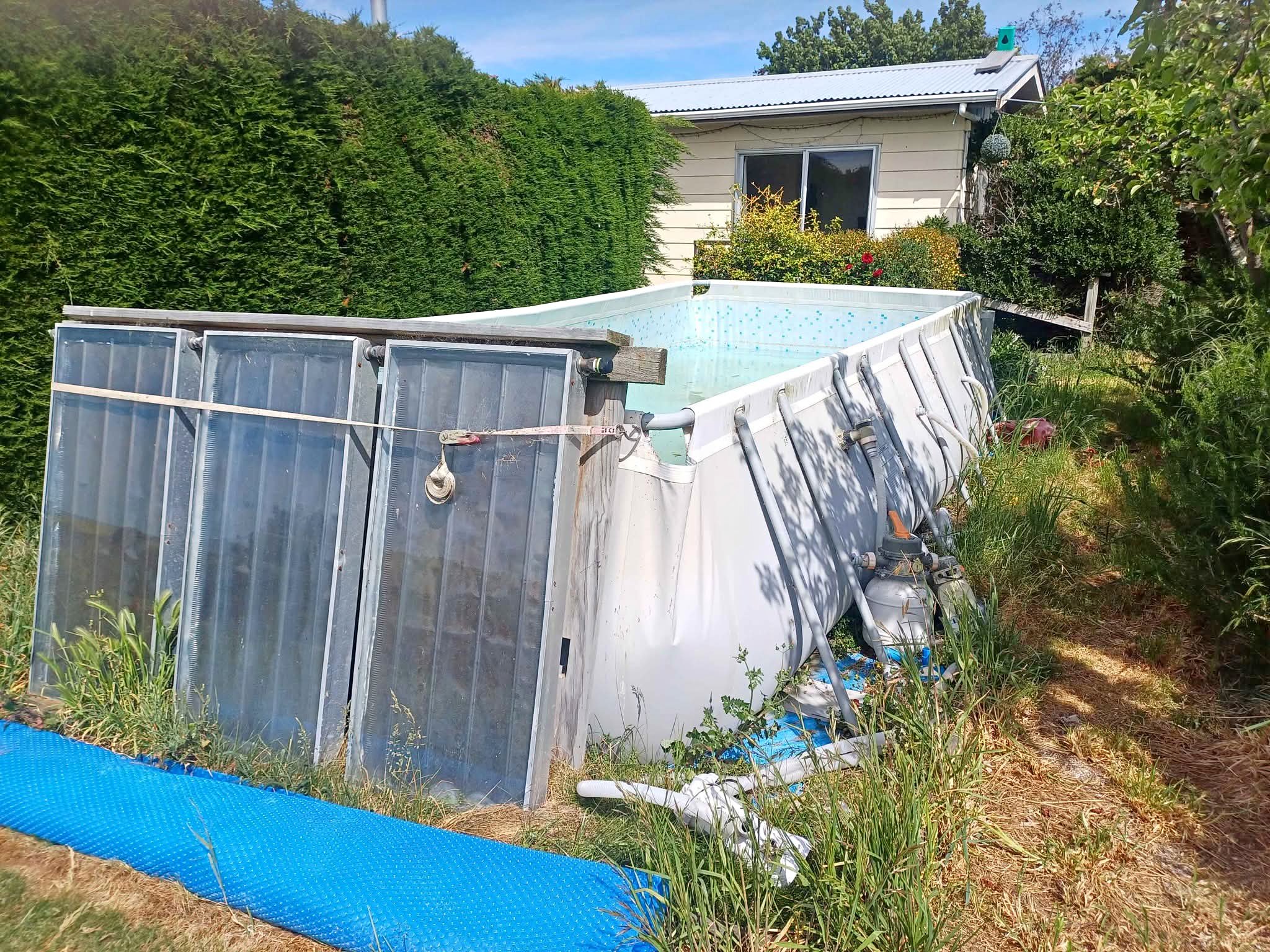 Large Swimming pool with solar heating panels and cover - Pools & Spas ...