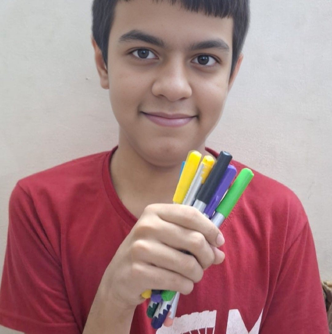 Beautiful muaz name written by an autistic rayan with both hands plz ...