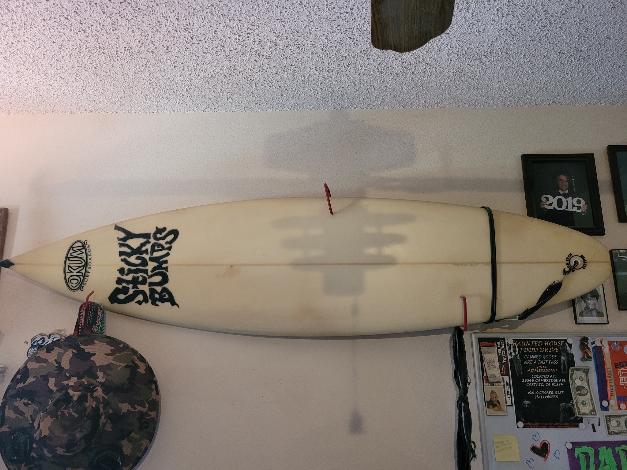 What is the history of Okum surfboards?