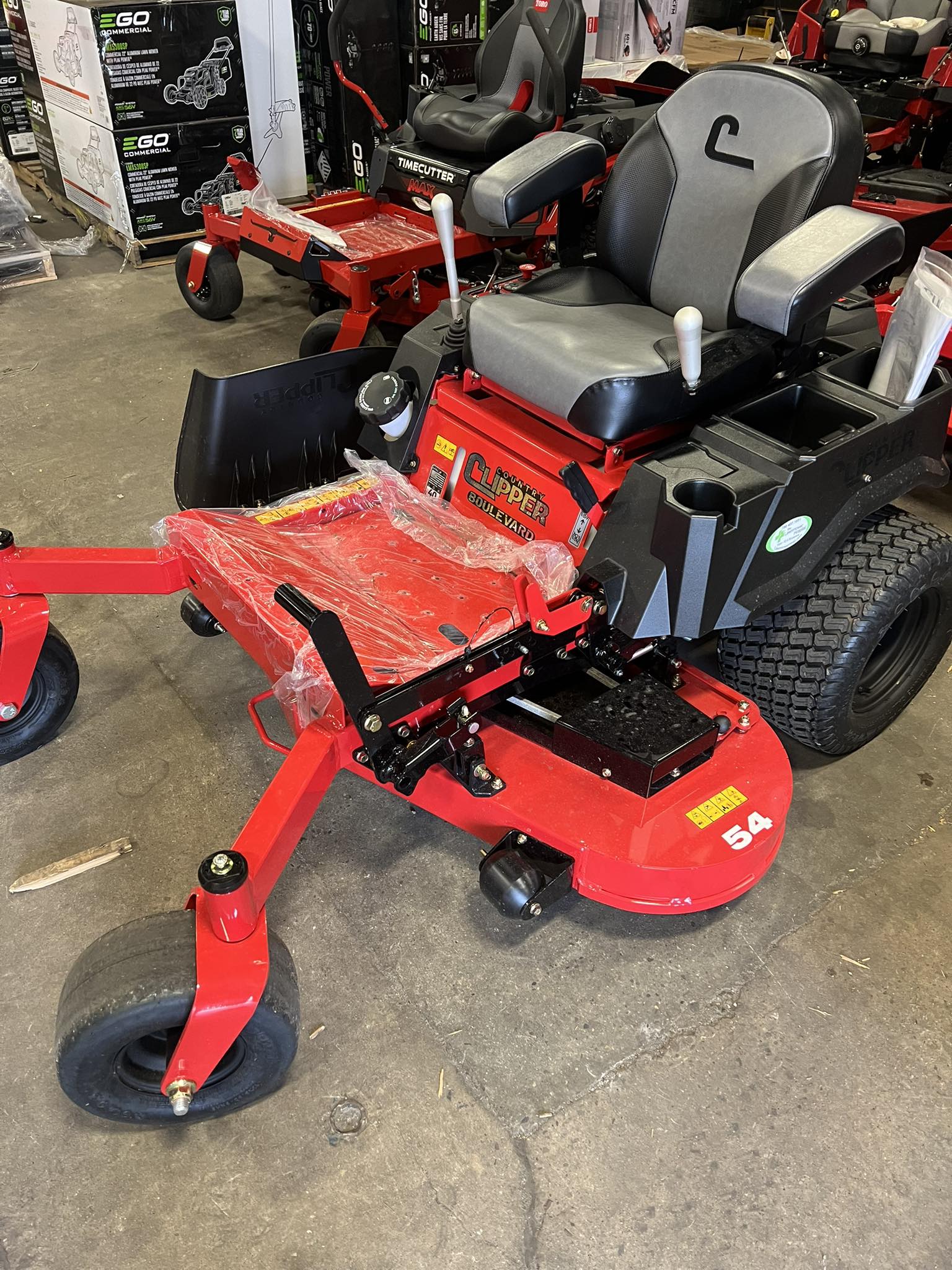 Which lawn mower is better, Country Clipper or Toro Titan, for a