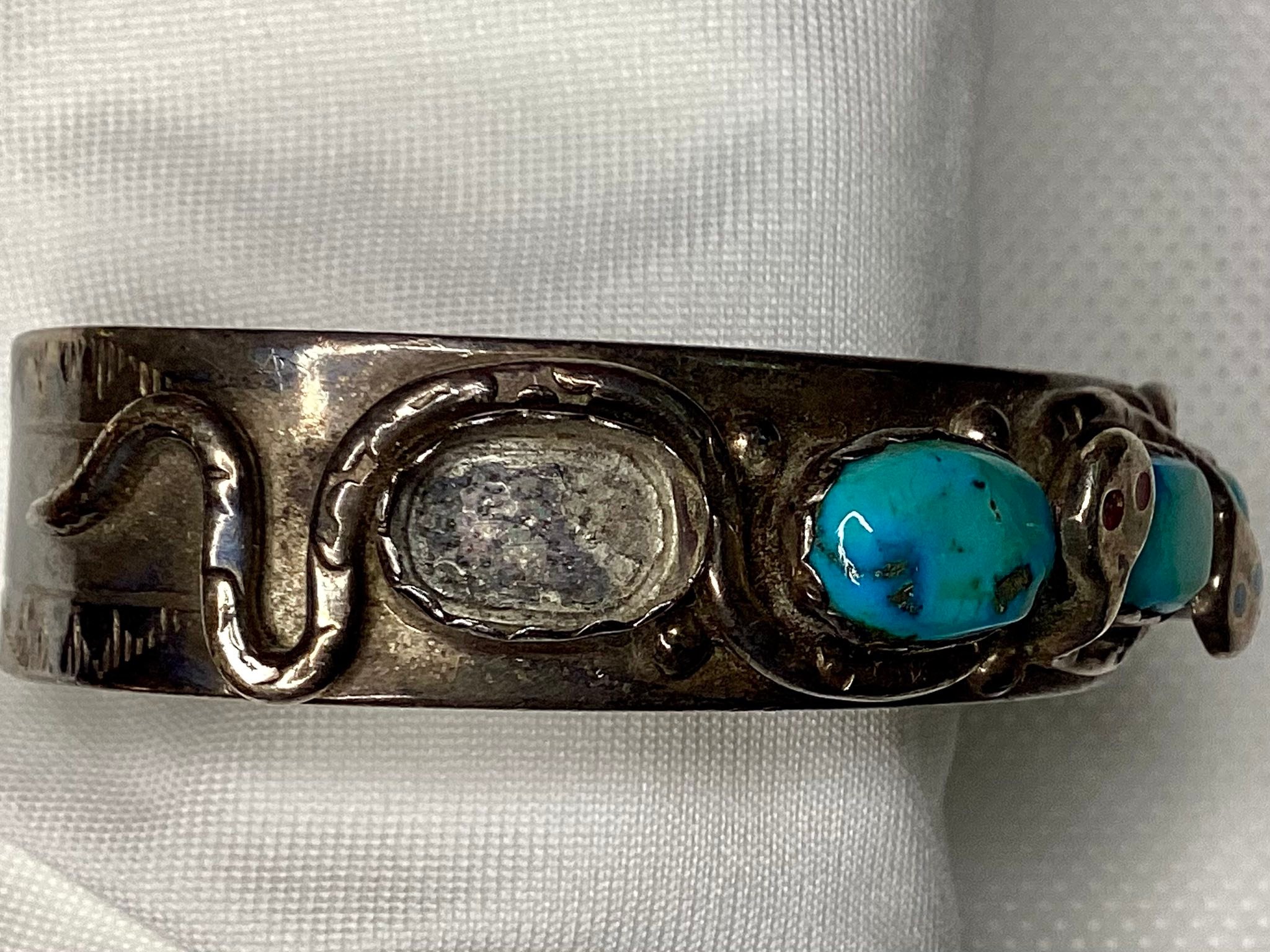 What's a fair price for a damaged Effie Calavaza snake bracelet?