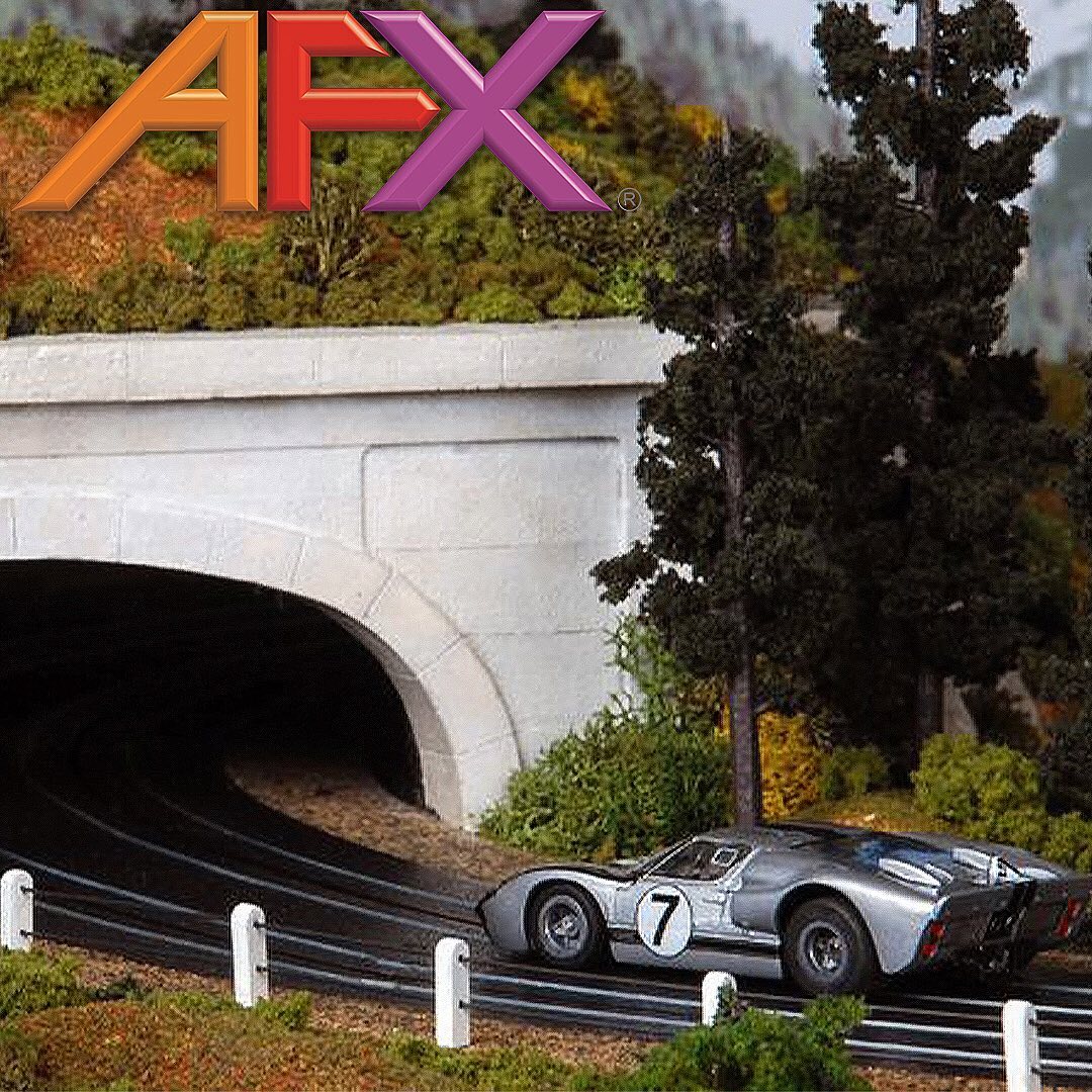 AFX Racing - Can you believe this is 64 times smaller than...