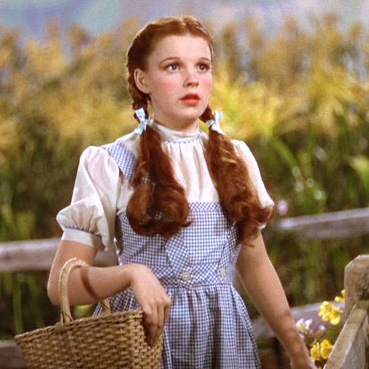 A long-lost blue-and-white gingham pinafore dress worn by Judy 