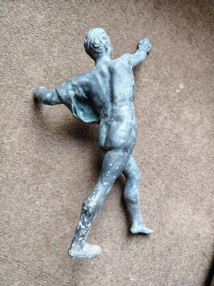 What is this ancient bronze sculpture of a man throwing a javelin?