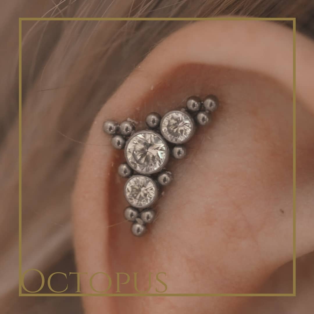 Octopus piercing studio - Healed helix with crystal cluster Done by ...