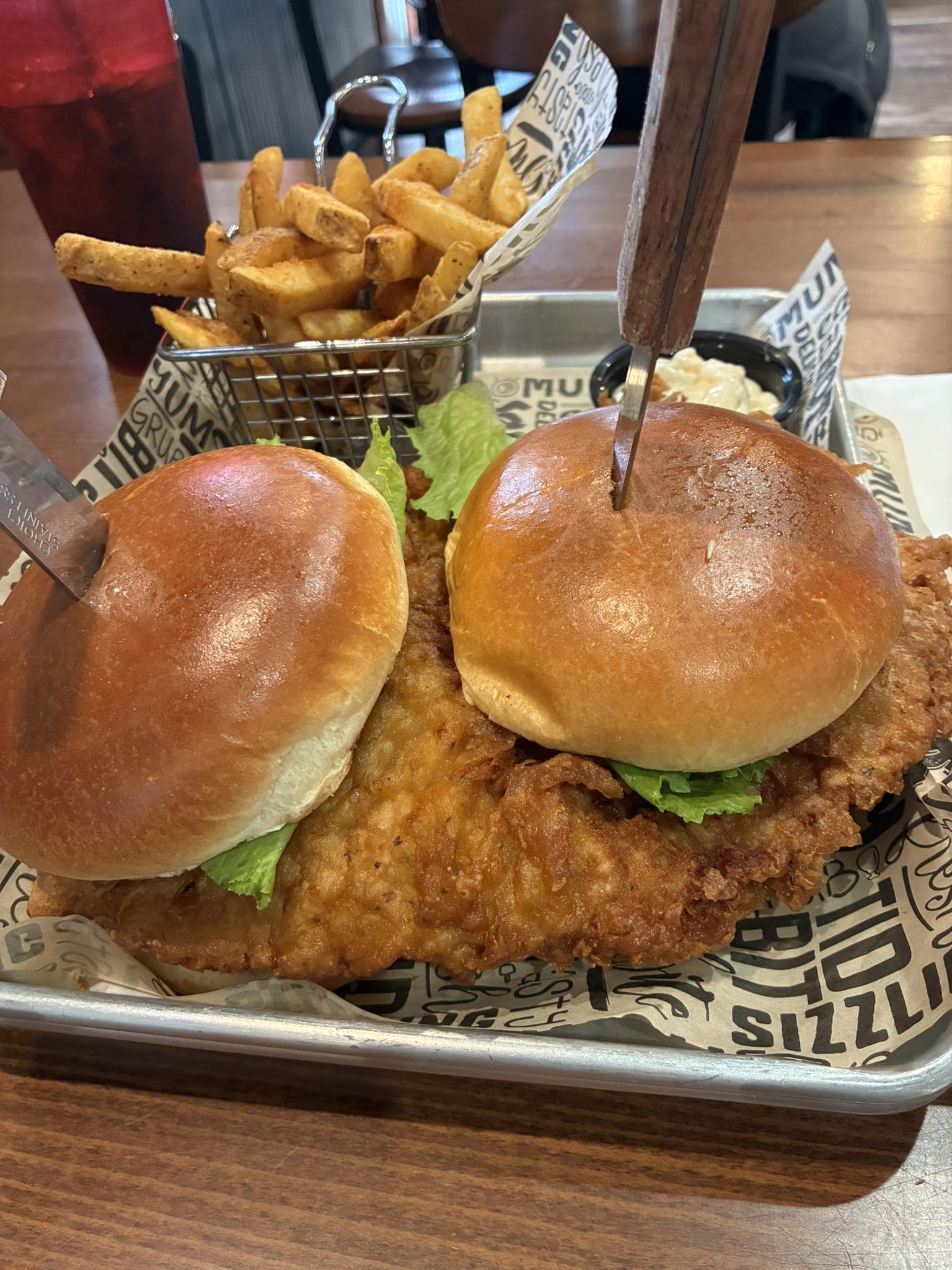 Woodshed Tap's crispy Cajun tenderloin sandwich in Bass Lake, Indiana