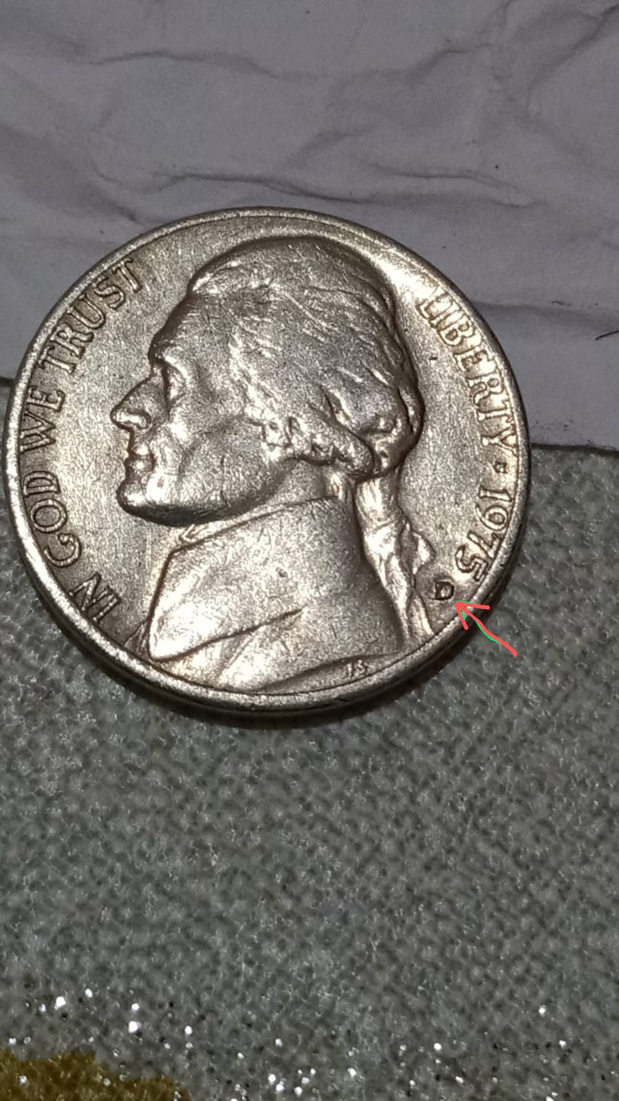 Were coins often engraved with names or numbers?