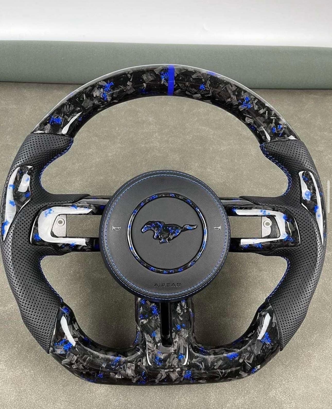 Our new Slasher Edition steering wheel in black suede with gold