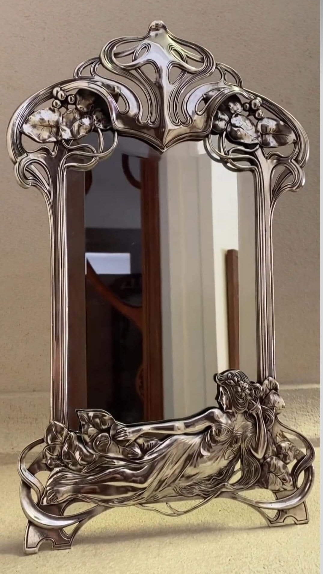 Art Nouveau silvered table mirror with nude Circa 1900 by Raphael