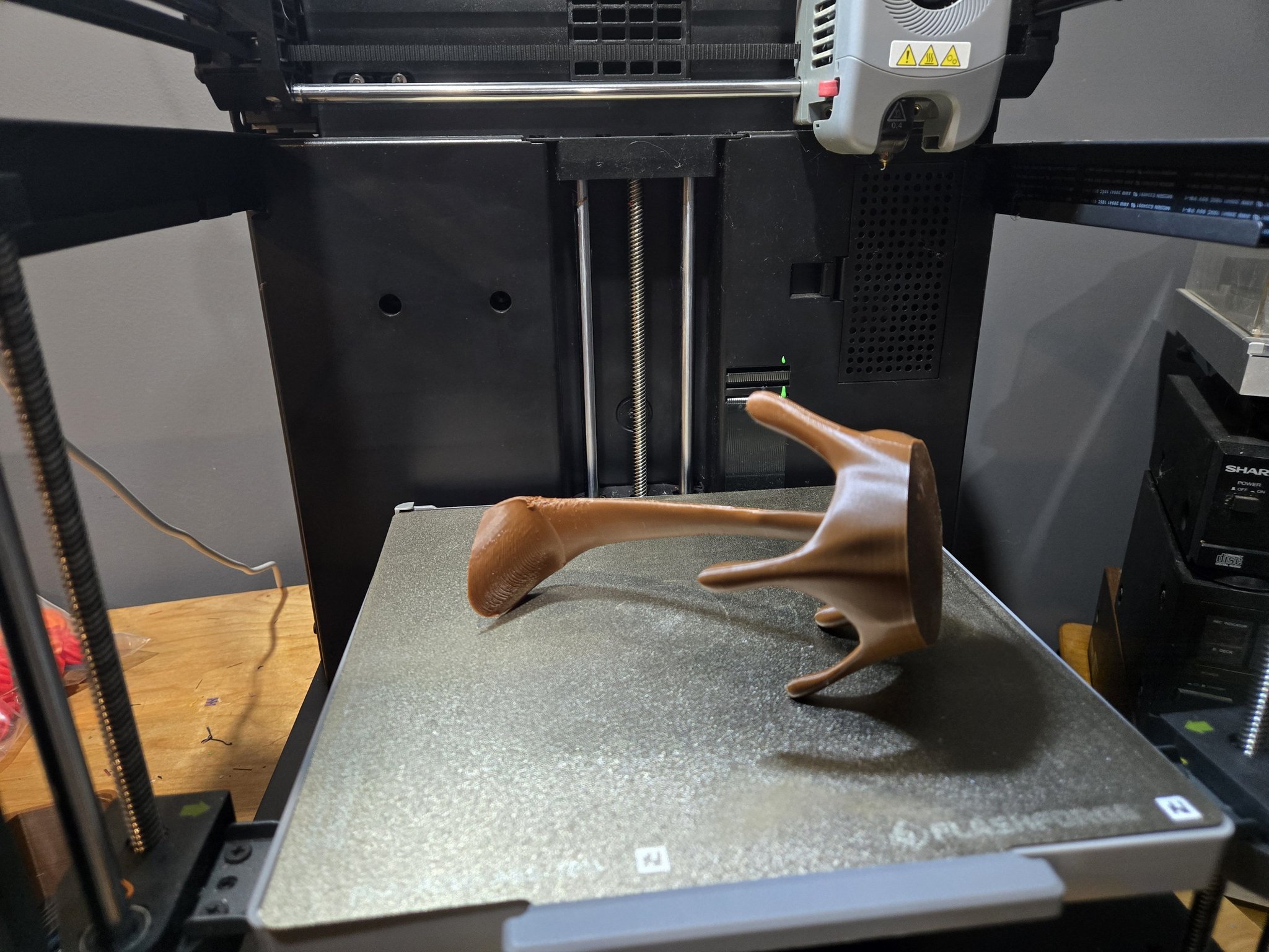 What causes FlashForge Adventurer 5 bed to shake and go down?