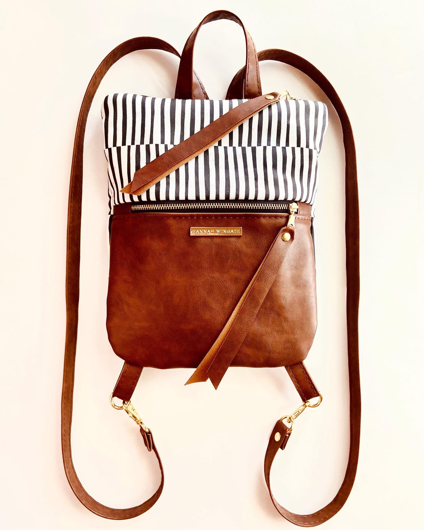 brandy melville striped leather flap backpack CONSUELA- Also great for traveling. Brandy melville womens backpacks -
