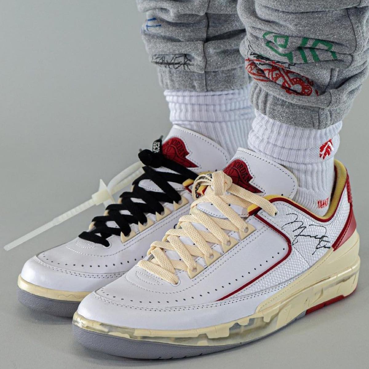 On-feet look at the OFF-WHITE x Air Jordan 2 Low in White/Red 