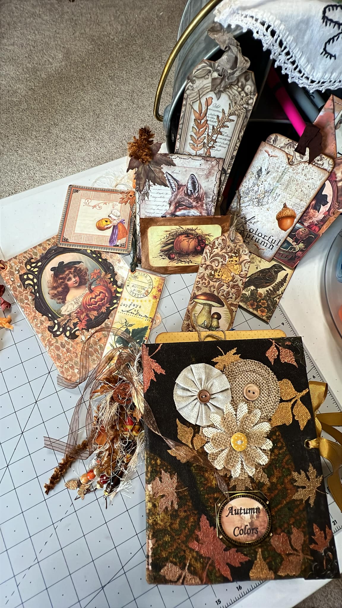 Autumn-themed junk journal page with brown background and ephemera