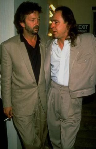 Eric Clapton and Stevie Ray Vaughan (hatless)