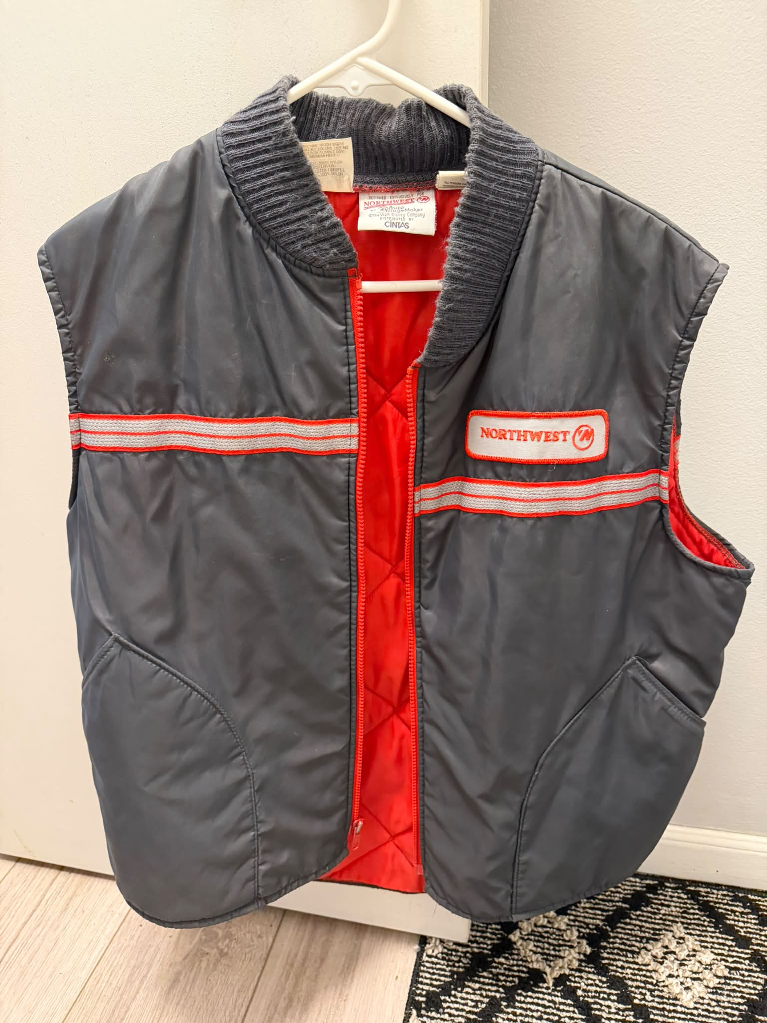 Vintage Northwest Airlines vest with reflective stripes and red lining
