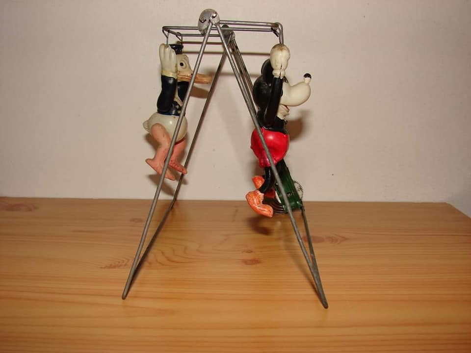 Mickey and Donald Duck on Trapeze celluloid and tin wind up toy