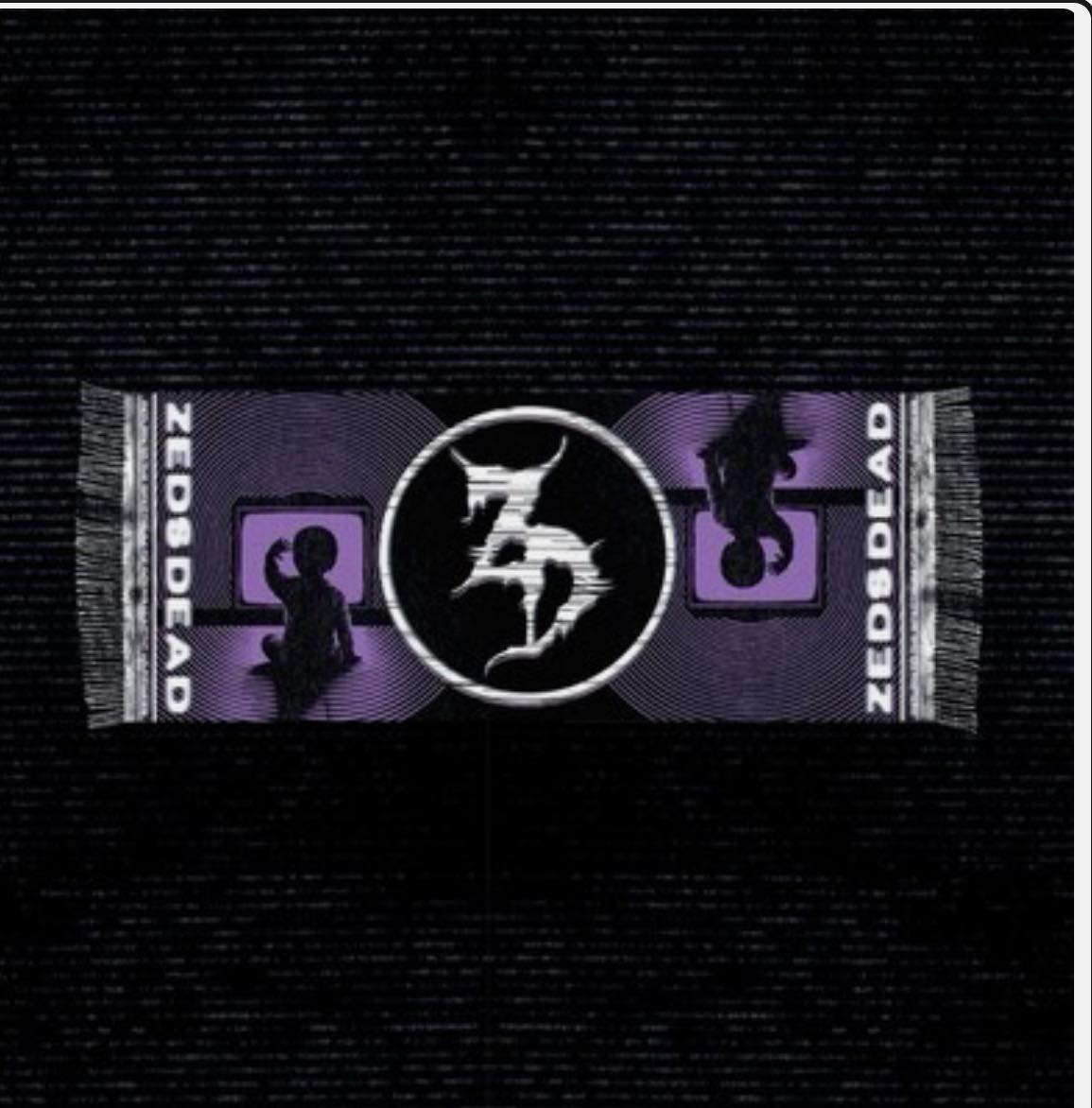 Lost Zeds Dead pashmina at Electric Forest 2026 near the maze