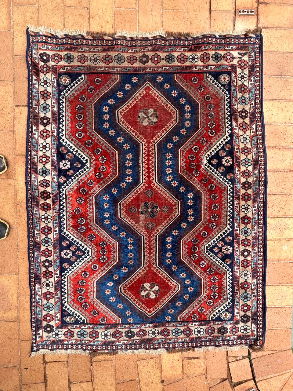 What is this vintage Persian-style rug?