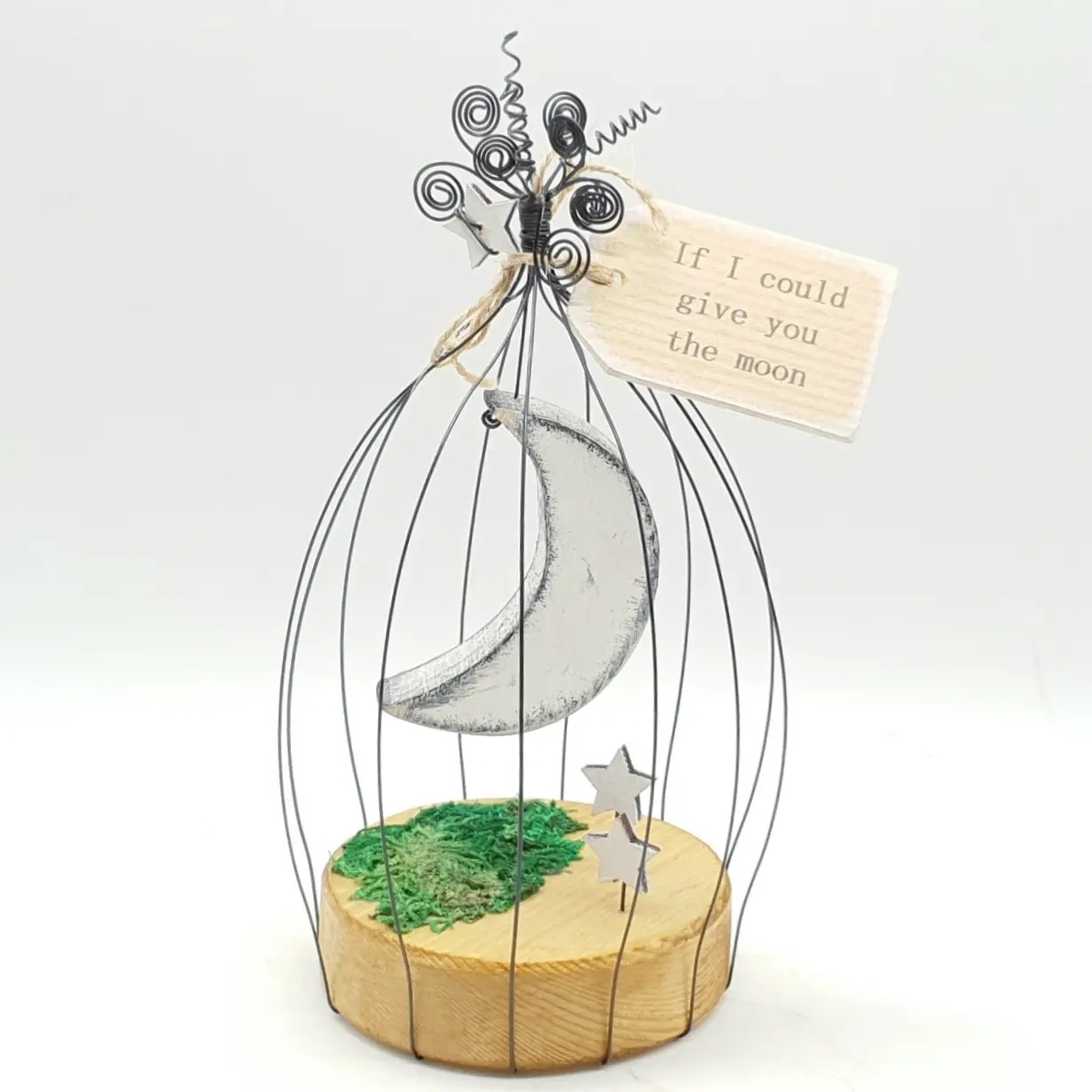 Some wooden moons in cages ready today,... - Behind the Times | Facebook