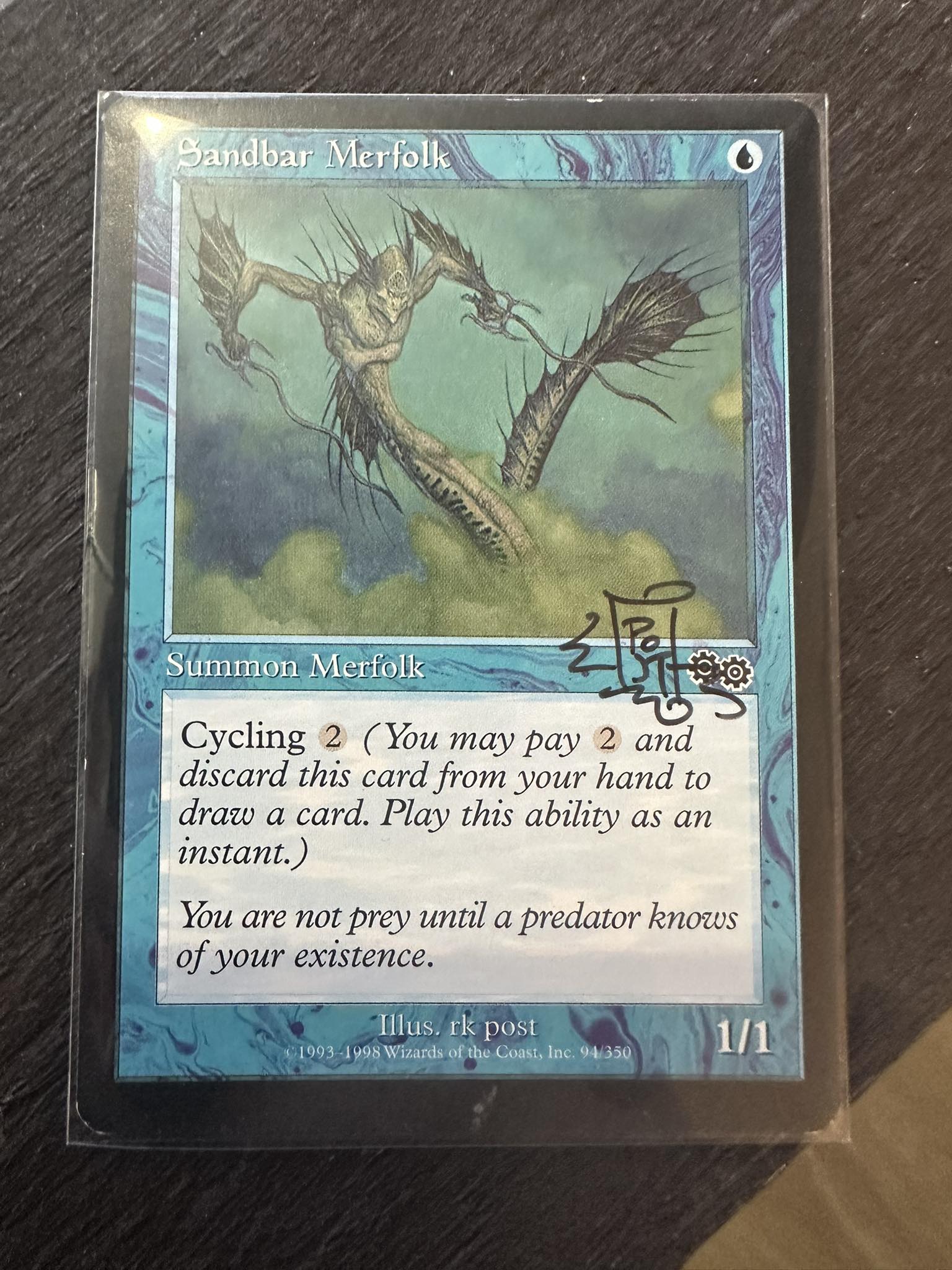 Are these Magic: The Gathering tokens signed by RK Post?