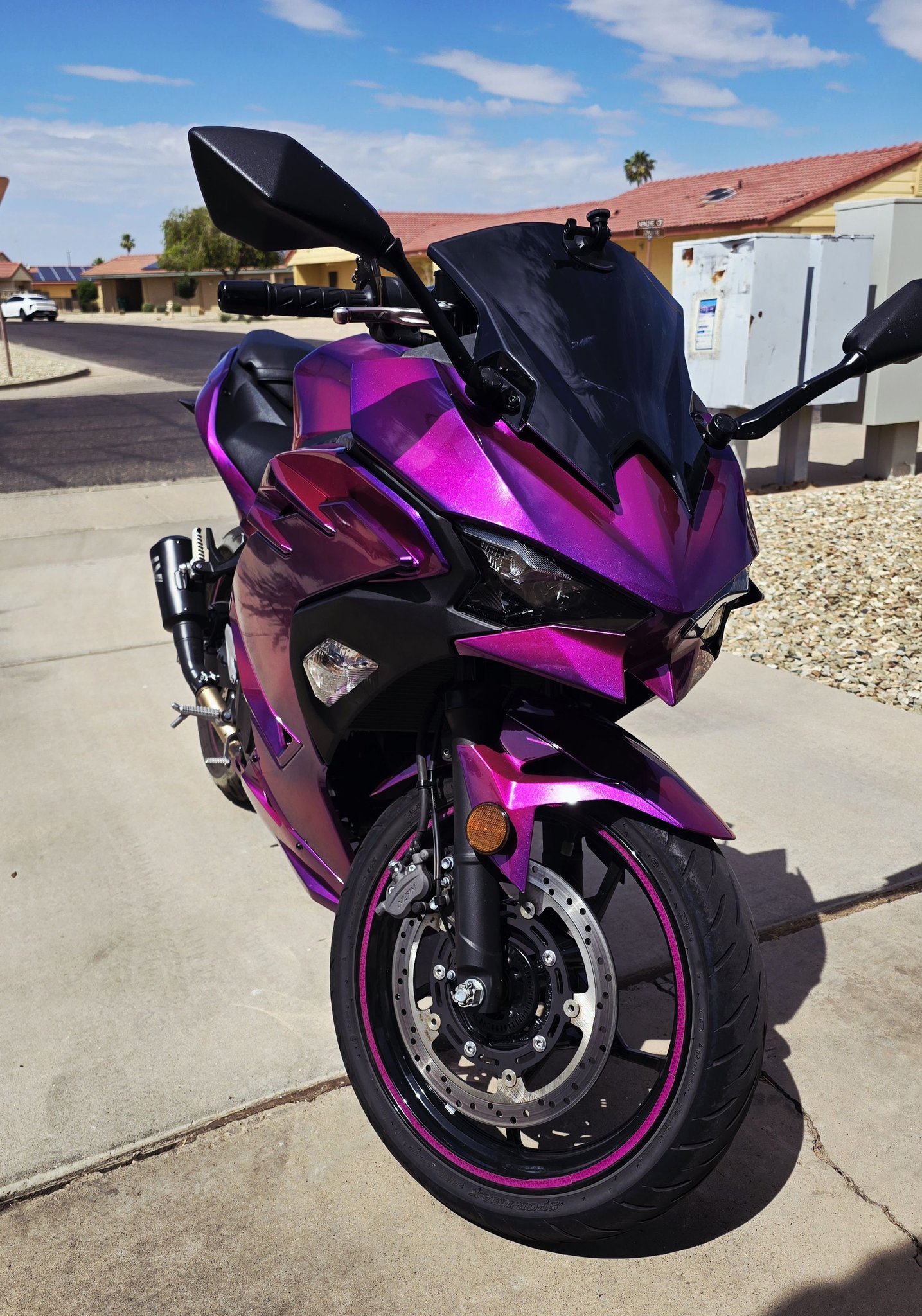 Faded pink levers on Kawasaki Ninja