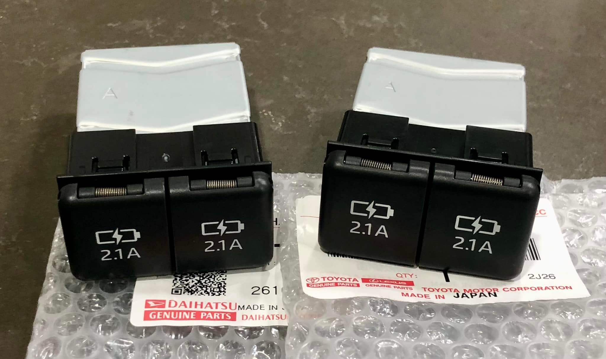 Peter's Garage - OEM JDM rear center console double USB...