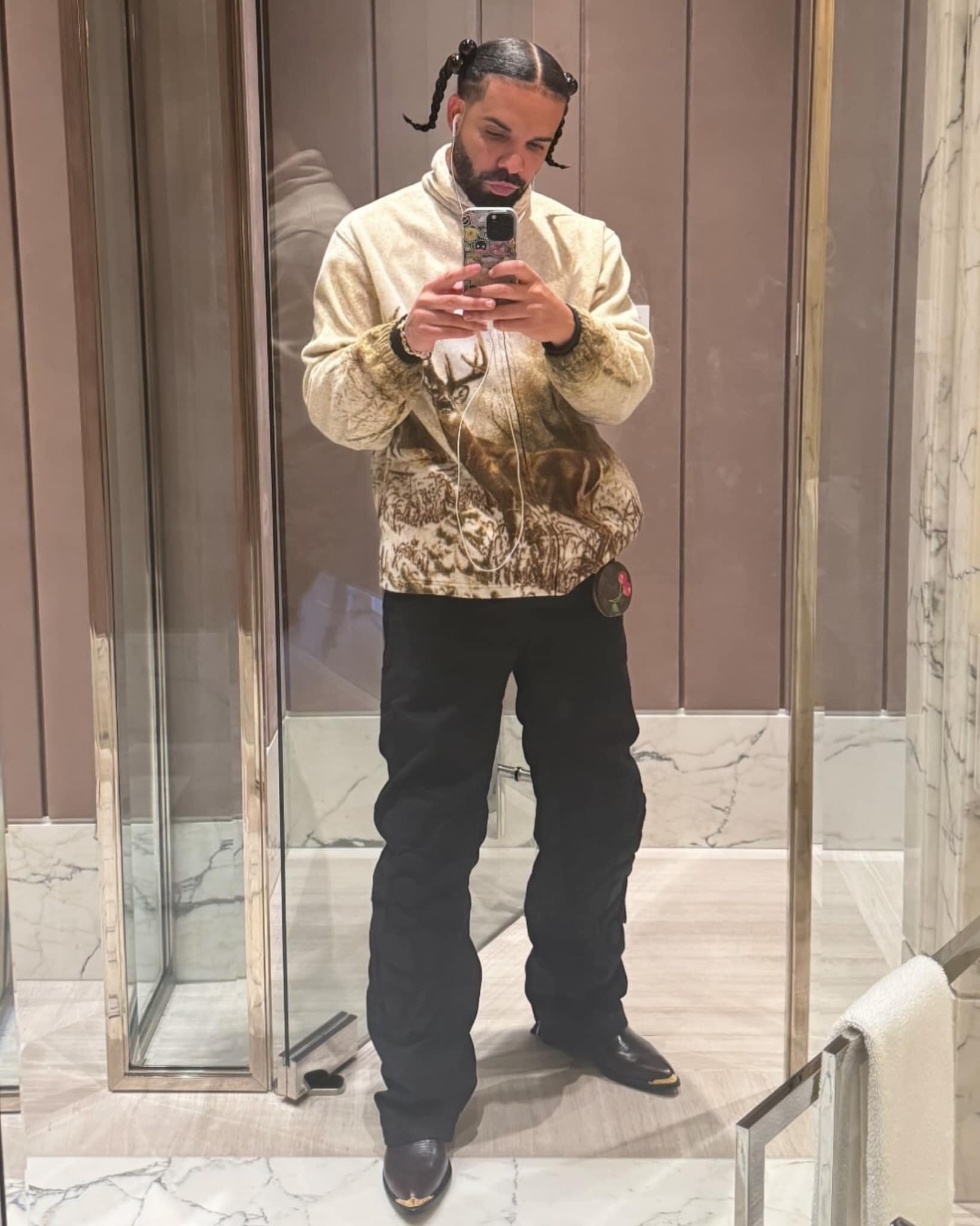 SPOTTED: Drake shares a classic selfie wearing unreleased PDF 