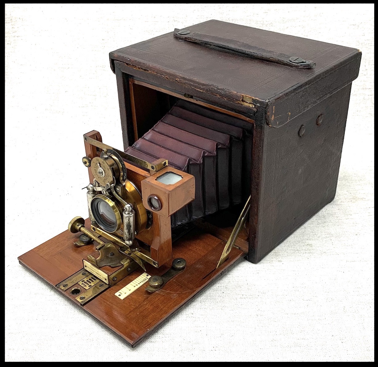 What is this old wooden 4x5 camera with Wollensak lens and Optimo