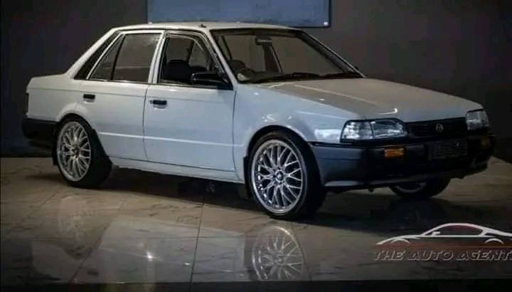 323 sedan mazda one kick n go💥$999 Zinara up to date Engine n