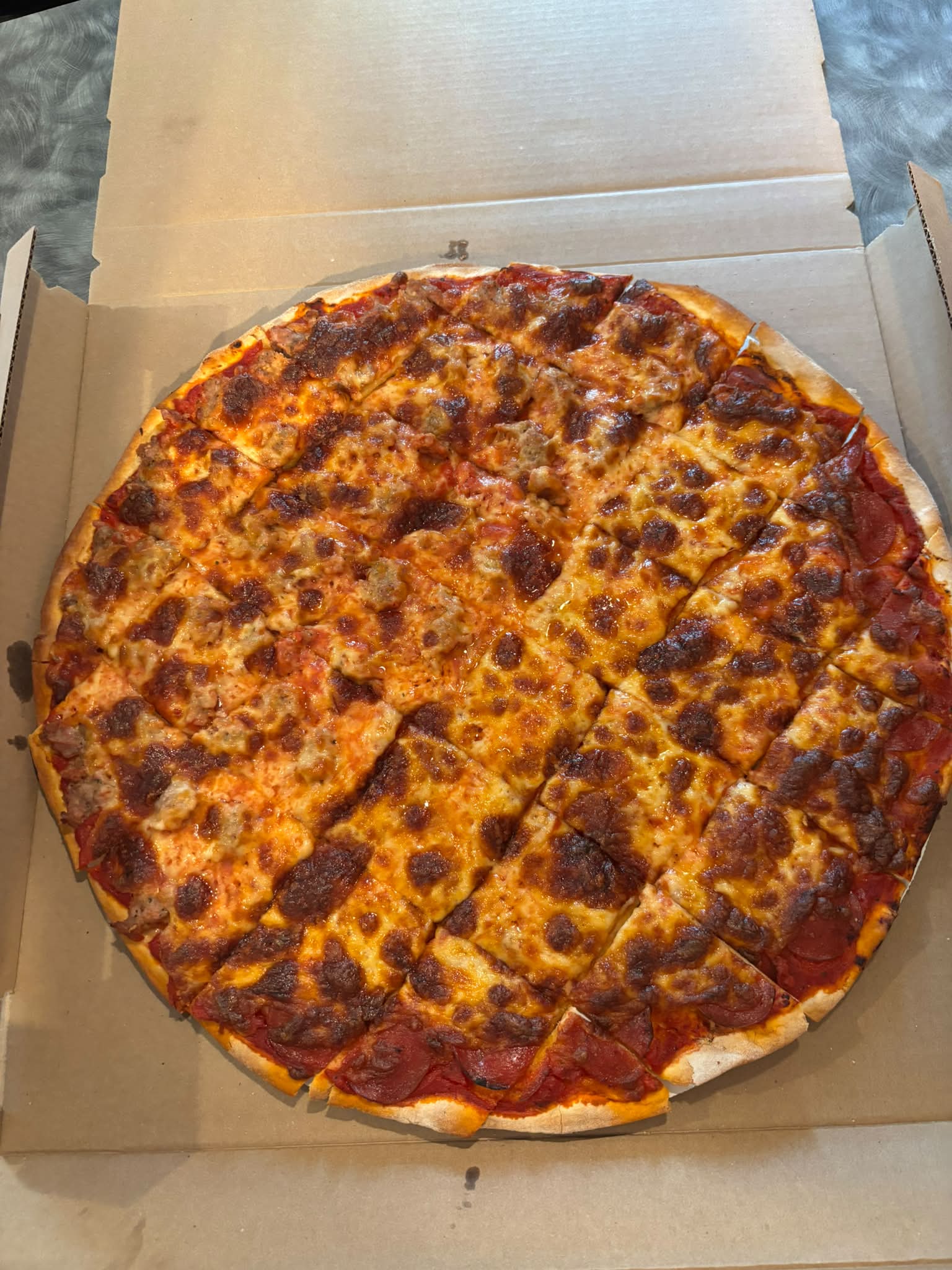 Nick's pizza in Chicago Ridge. It was delicious. Half off on Mondays!