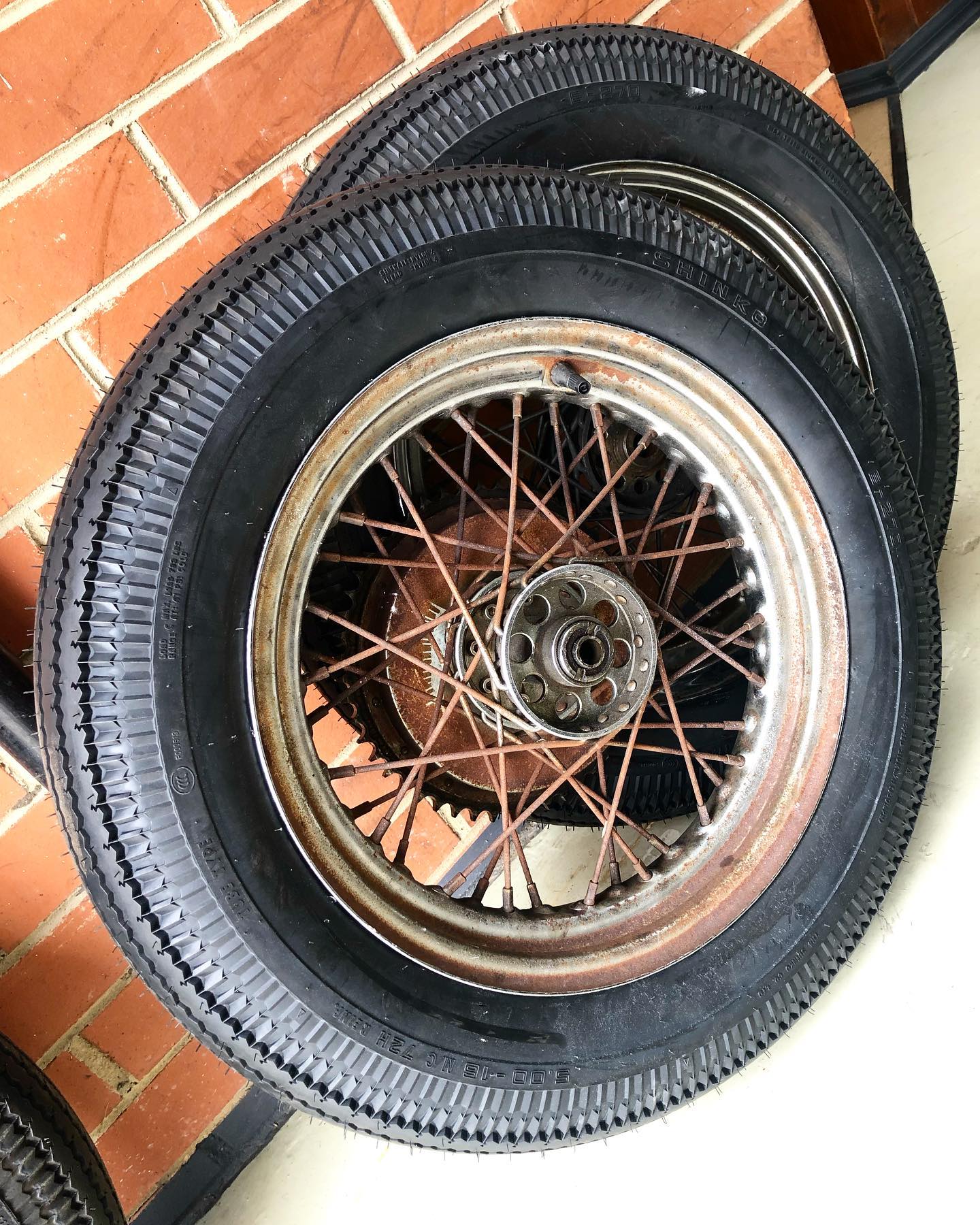 Fitted up some @shinko_tyres 500x16 e270 tyres. ... #antiquetyres 