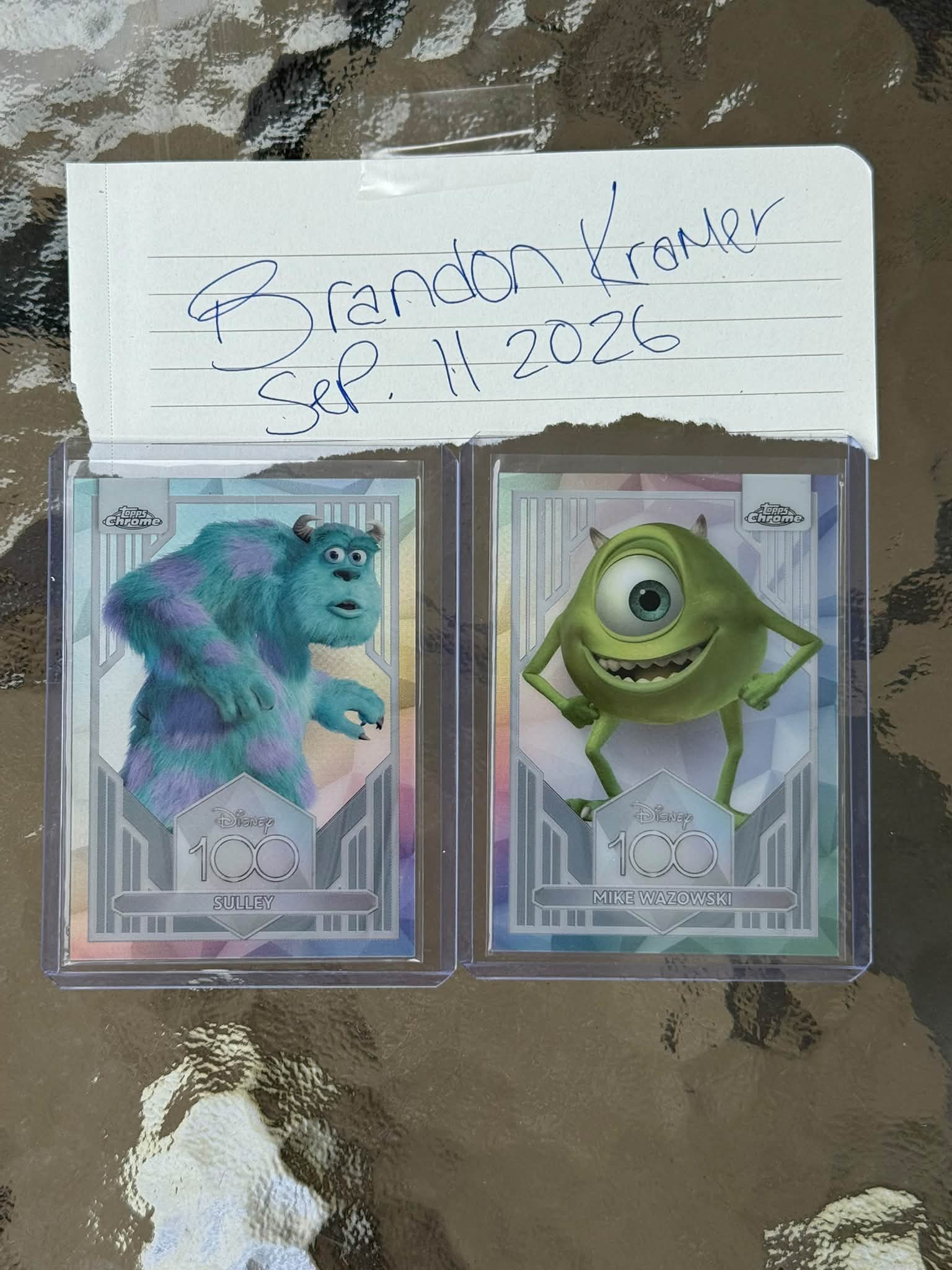 Topps Chrome Disney 100 holo refractors Sulley and Mike Wazowski
