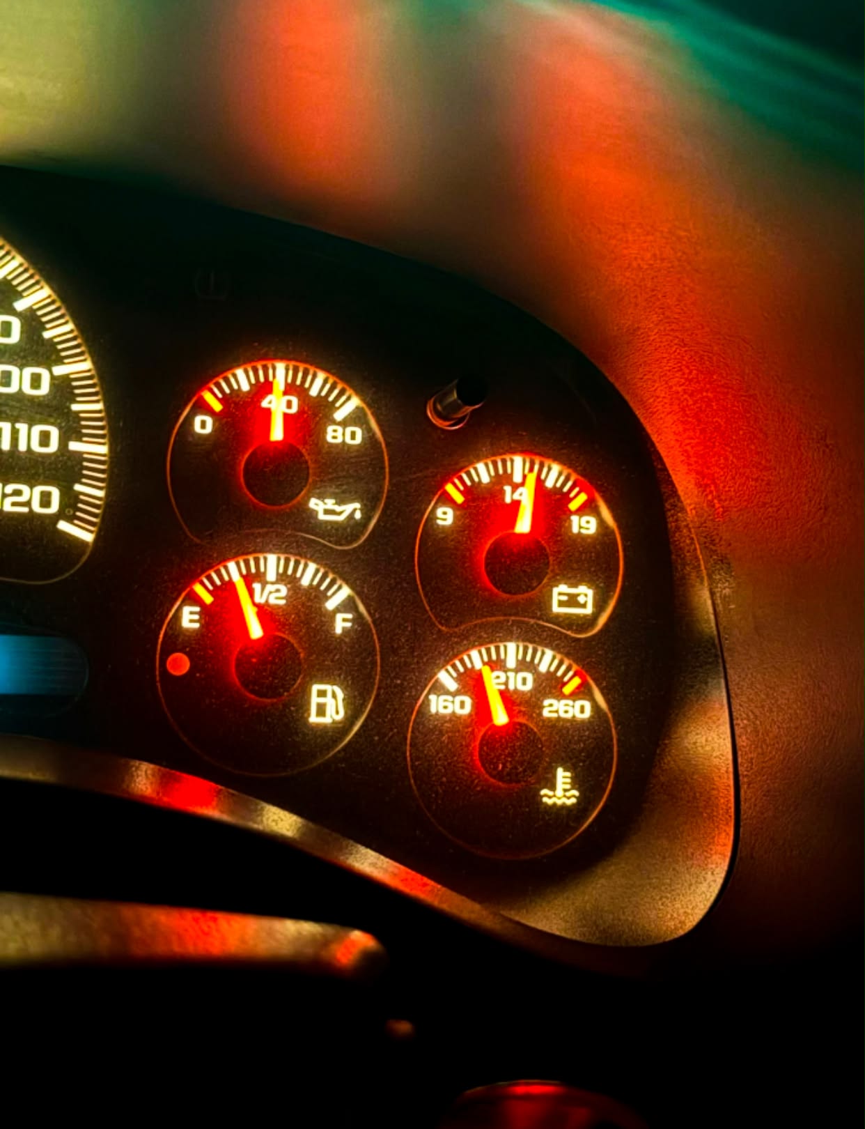 GMC Sierra AC and electric fan temperature gauge question