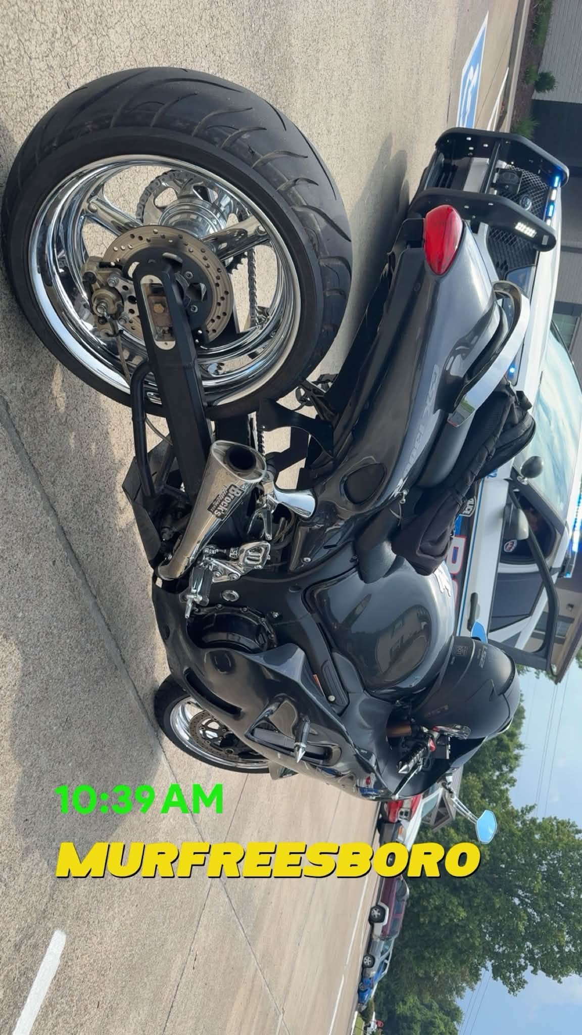 2005 Hayabusa motorcycle with stretched, fat tire kit and chrome