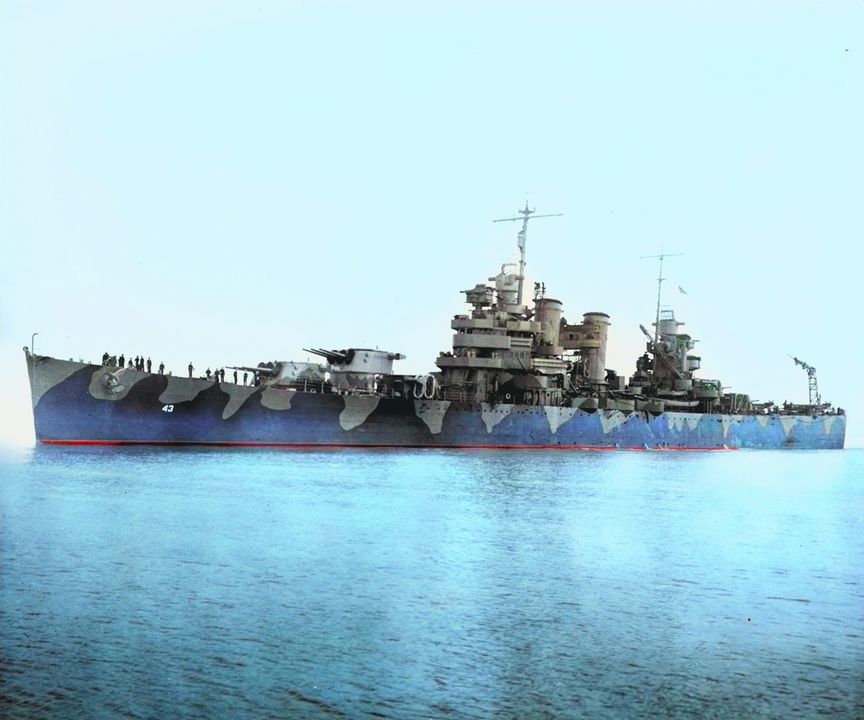 Navy crewmen on the light cruiser USS Nashville (CL-43) are seen