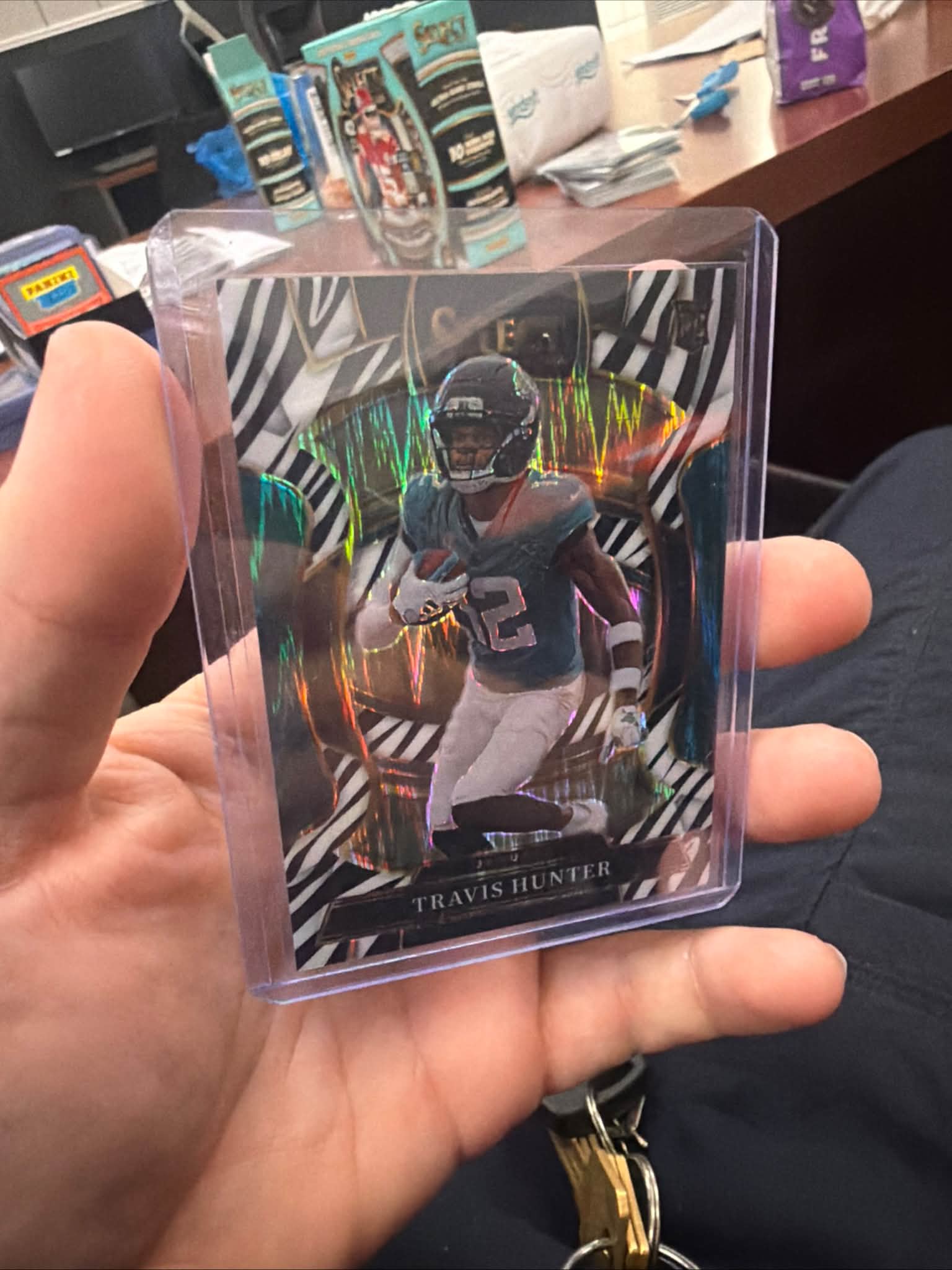 Travis Hunter zebra sports card pull with numbered and auto cards