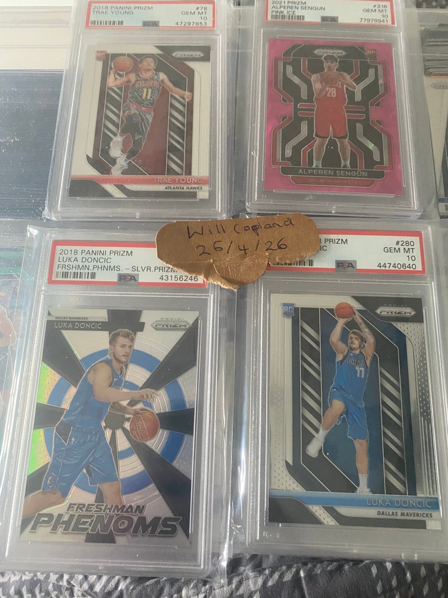 Luka Doncic and Trae Young rookie cards for sale