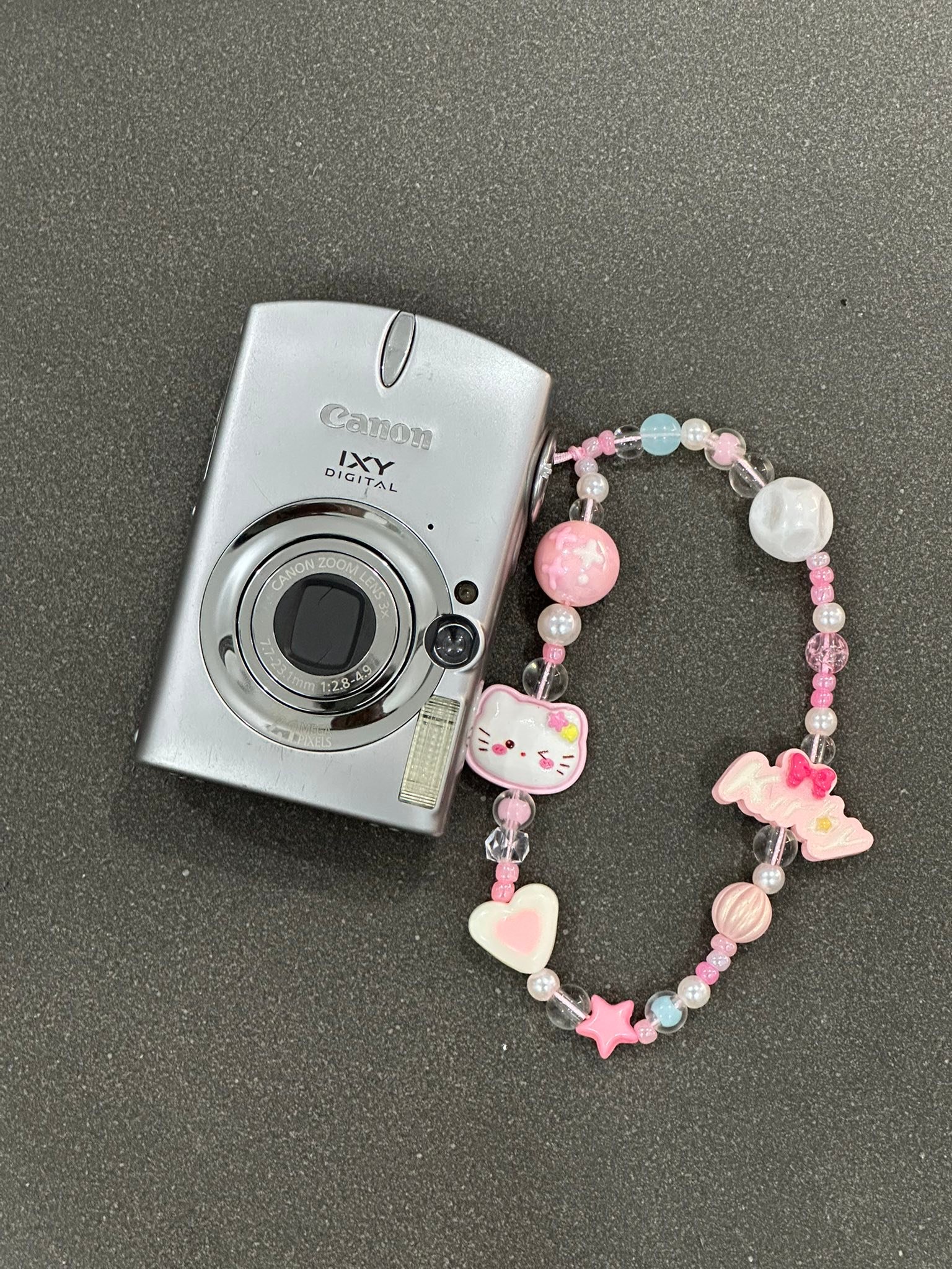 Canon ixy 750 giá 2tr750 ( có fix cho b fl page)