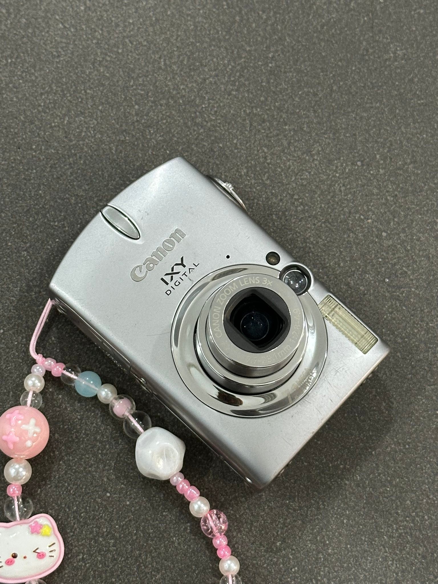 Canon ixy 750 giá 2tr750 ( có fix cho b fl page)