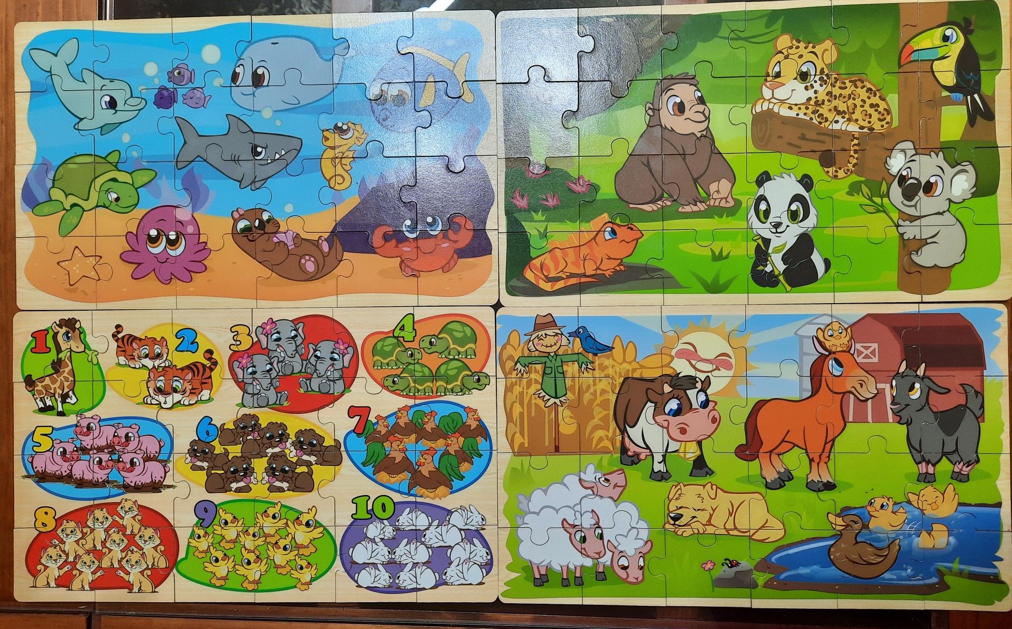 Los Morenitos - Set de 4 puzzles madera, cada uno de 24...